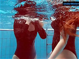 two super-steamy teens underwater